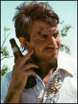 Kevin Costner with beer bottle